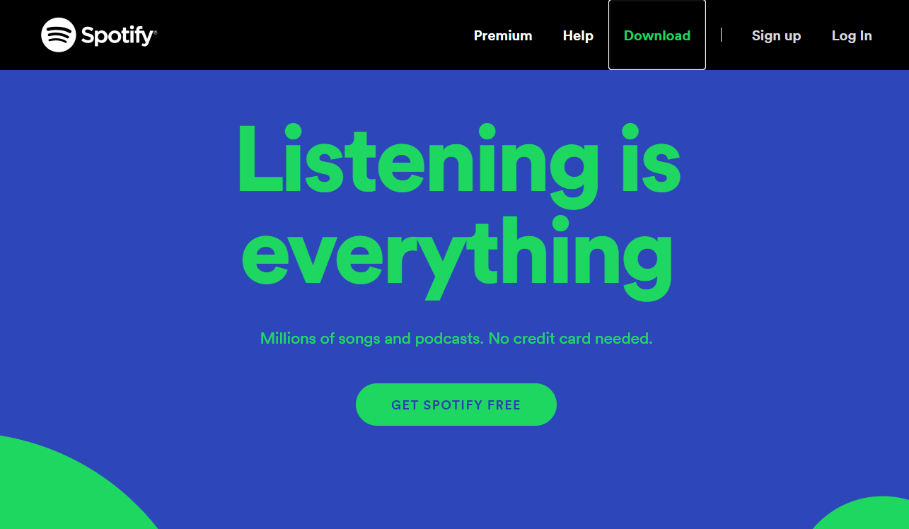 The Spotify home screen with a black banner at the top. A white box surrounds the “Download” option, which has also turned from white to green.